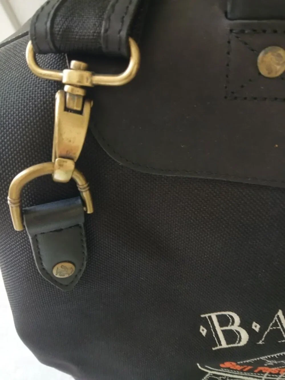 TOMMY BAHAMA Black Leather Canvas Travel Bag